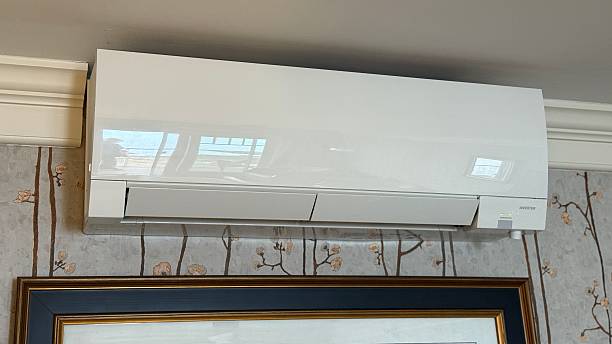 Professional HVAC technician installing ductless mini split Richmond VA